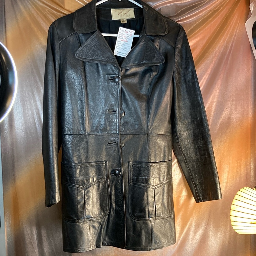Vintage 70’s black leather jacket with belted back waist. 36” chest 30” waist
